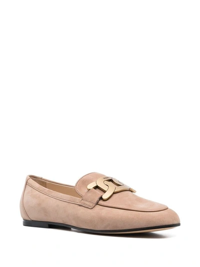 Shop Tod's Loafers With Chain In Beige