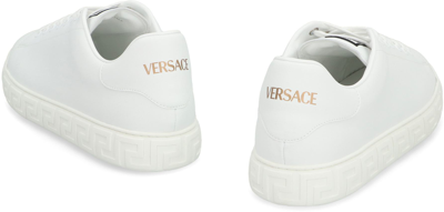 Shop Versace Greca Sneakers In White