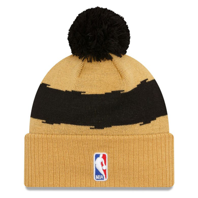 Shop New Era Gold Toronto Raptors 2023/24 City Edition Cuffed Pom Knit Hat