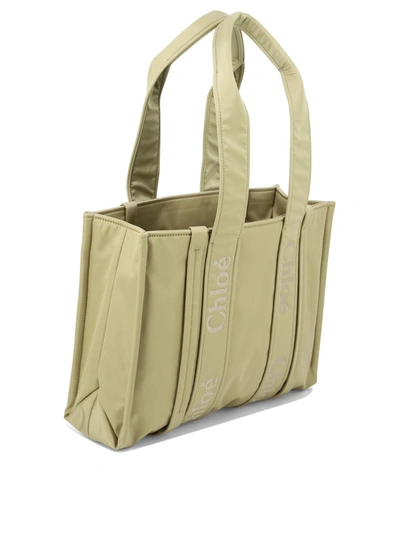 Shop Chloé "woody Medium" Shoulder Bag In Beige
