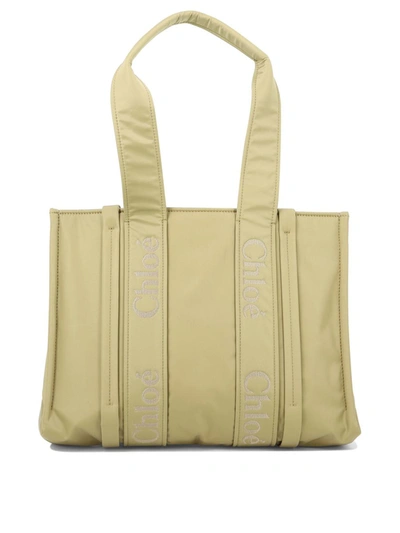Shop Chloé "woody Medium" Shoulder Bag In Beige