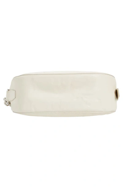 Shop Burberry Small Knight Asymmetric Crinkle Leather Shoulder Bag In Soap