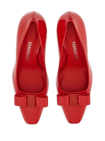 Ferragamo Pointed Toe Kitten Heel Pumps With Bow Detailing In Flame Red
