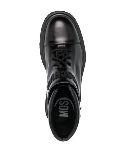 Moschino Logo-embossed Lace-up Leather Boots In .