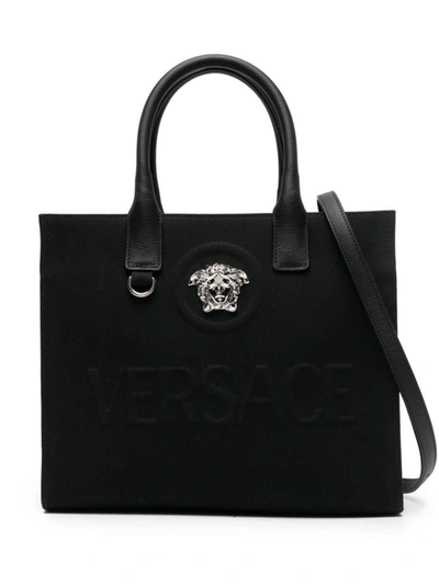 Shop Versace 'la Medusa' Bag In Black