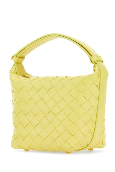 Shop Bottega Veneta Handbags. In Yellow