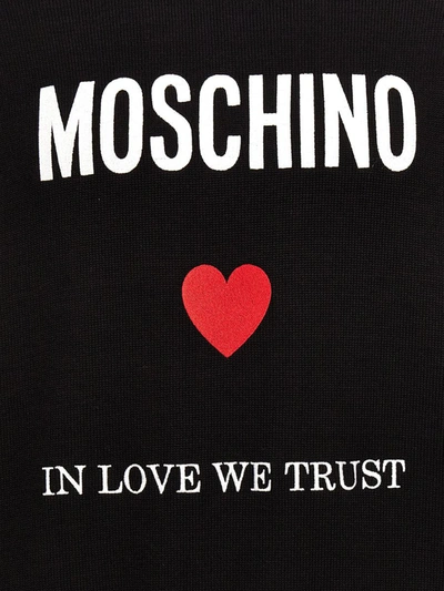 Shop Moschino 'in Love We Trust' Hoodie In Black