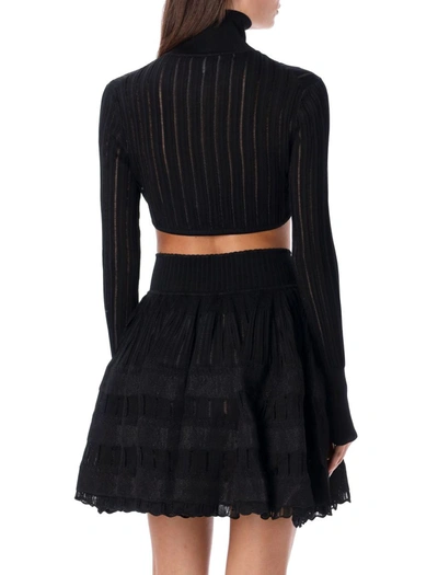 Alaïa Long Sleeved Knitted Cropped Cardigan In Black