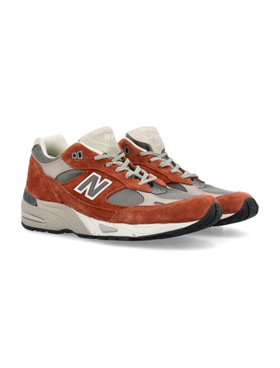 Shop New Balance 991 Sneaker In Orange/grey