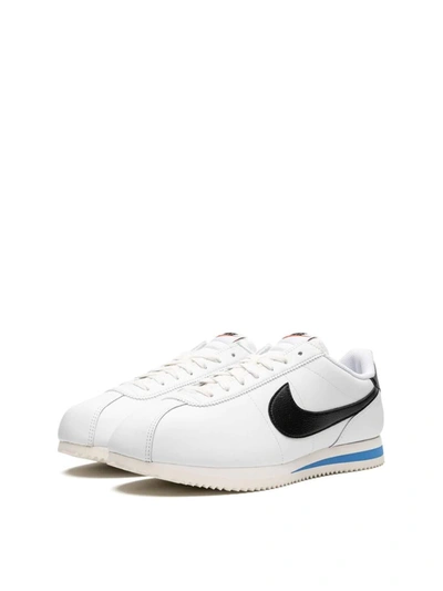 Shop Nike Cortez Low-top Sneakers In White