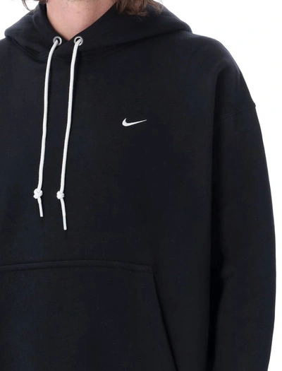 Shop Nike Solo Swoosh Hoodie In Black