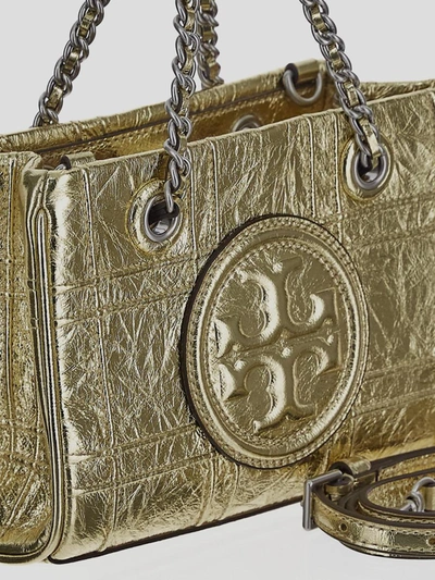Shop Tory Burch Flemig Soft Handbag In Golden