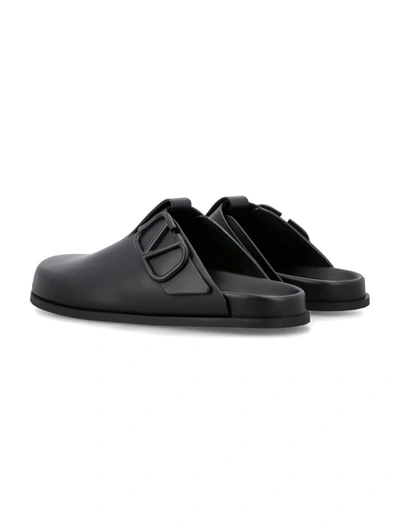 Shop Valentino Garavani Clog V Sandals In Black