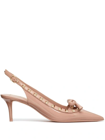 Shop Valentino Garavani Rockstud Bow Leather Pumps In Powder