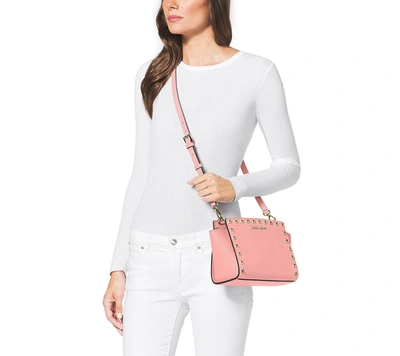 Shop Michael Kors Selma Studded Medium Messenger Bag In Pale Pink