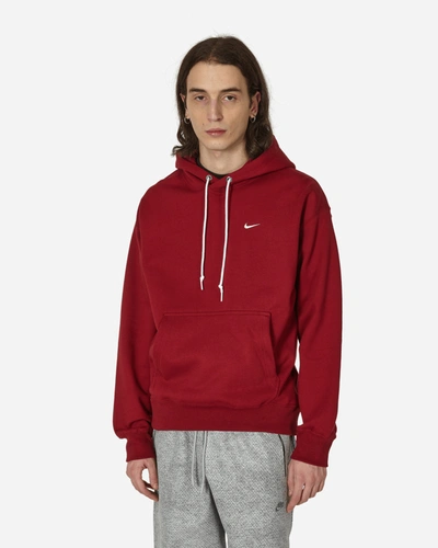 Shop Nike Solo Swoosh Hooded Sweatshirt Team Red In Multicolor