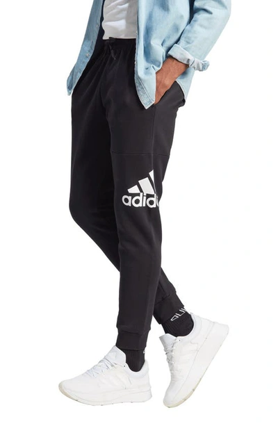 Shop Adidas Originals Essentials Fleece Tapered Joggers In Black