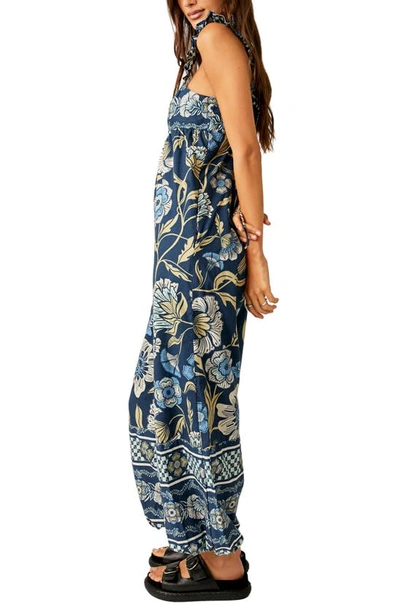 Shop Free People Bali Albright Floral Cotton Jumpsuit In Navy Combo