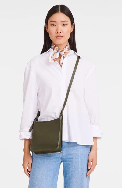 Shop Longchamp Small Le Foulonné Leather Crossbody Bag In Khaki