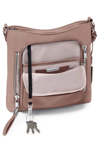 Shop Tumi Tyler Crossbody Bag In Light Mauve