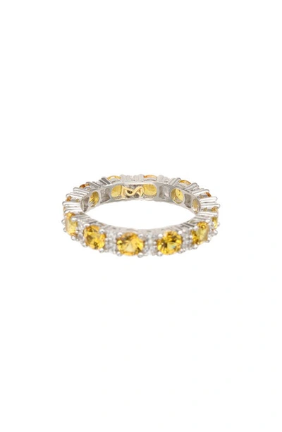 Suzy Levian Sterling Silver Round Cut Yellow Sapphire And Diamond Accent Eternity Band In Yellow