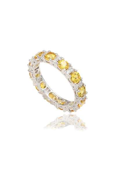 Suzy Levian Sterling Silver Round Cut Yellow Sapphire And Diamond Accent Eternity Band In Yellow