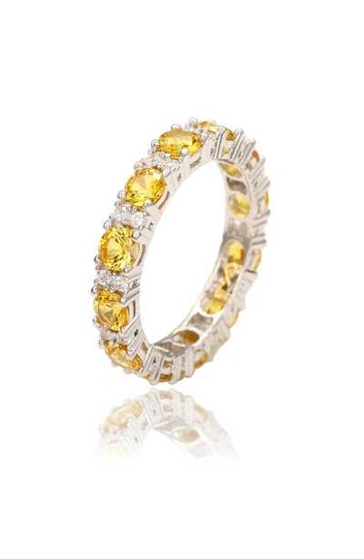 Suzy Levian Sterling Silver Round Cut Yellow Sapphire And Diamond Accent Eternity Band In Yellow