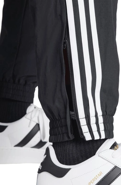 Shop Adidas Originals Adidas Adicolor Firebird Recycled Polyester Track Pants In Black