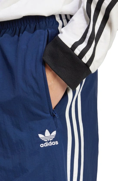Shop Adidas Originals Adicolor Firebird Recycled Polyester Track Pants In Night Indigo