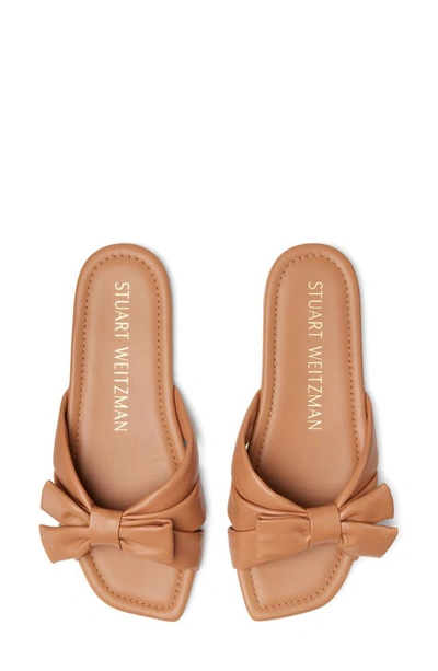 Shop Stuart Weitzman Sofia Bow Slide Sandal In Tan Leather