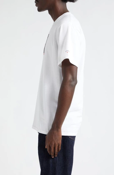 Shop Noah God Bless Cotton Graphic T-shirt In White