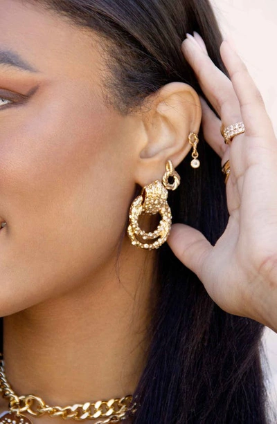 Ettika Crystal Knot Earrings In Gold