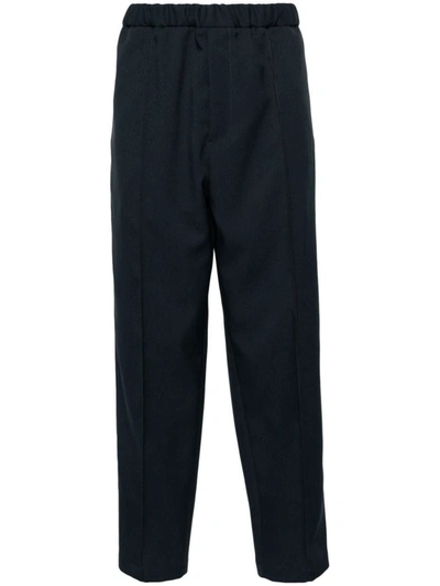 Shop Jil Sander Tapered Trousers In Blue