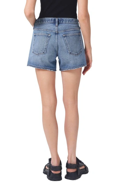 Shop Agolde Parker Long Relaxed Organic Cotton Denim Shorts In Occurrence