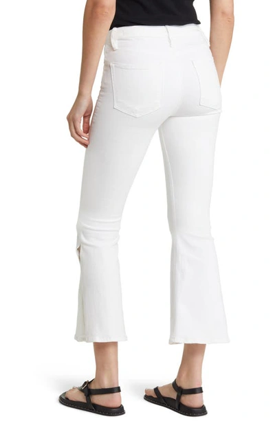 Shop Frame Le Crop Slit Mini Flare Jeans In Blanc