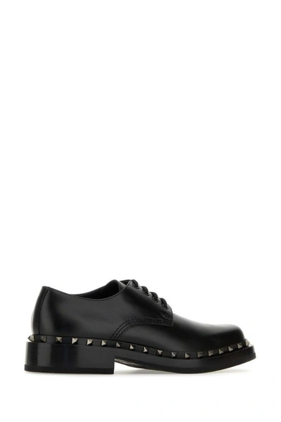 Shop Valentino Garavani Man Black Leather Rockstud M-way Lace-up Shoes