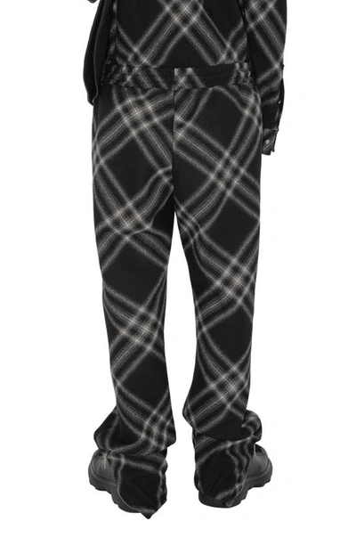 Shop Burberry Relaxed Fit Check Zip Hem Wool Pants In Monochrome Ip Check