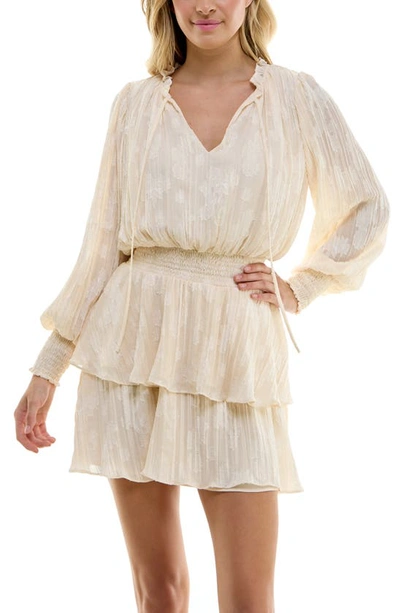 Shop Socialite Smocked Tiered Ruffle Long Sleeve Minidress In Cream