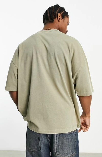 Shop Asos Design Oversize Heavyweight T-shirt In Washed Green