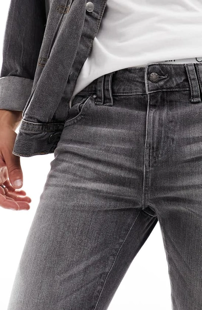 Shop Asos Design Washed Skinny Jeans In Black