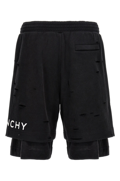 Shop Givenchy Men Detroyed-effect Bermuda Shorts In Black