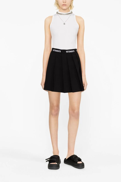 Shop Vetements Women Logo School Girl Skirt In Black