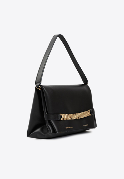 Shop Victoria Beckham Chain Nappa Leather Pouch With Strap In Black