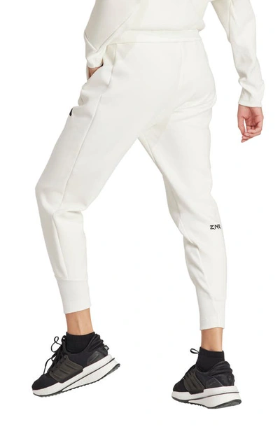 Shop Adidas Originals Z.n.e Performance Joggers In Off White