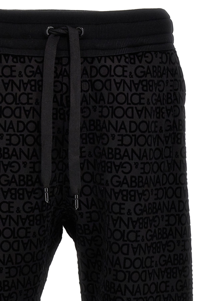 Shop Dolce & Gabbana Men Flocked Logo Joggers In Black