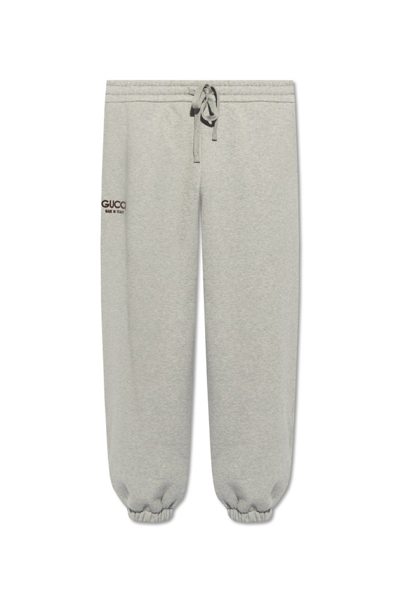 Shop Gucci Logo Printed Drawstring Track Pants In Grey