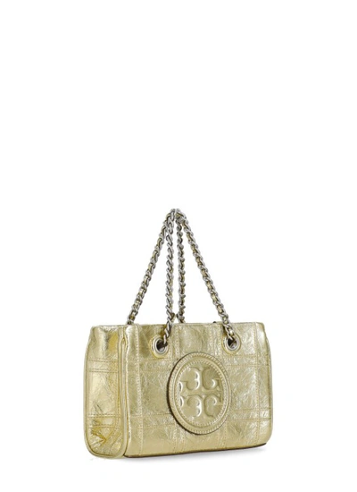 Shop Tory Burch Fleming Mini Shopping Bag In Gold
