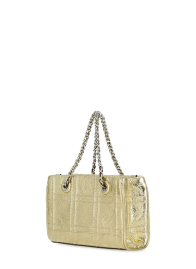 Shop Tory Burch Fleming Mini Shopping Bag In Gold