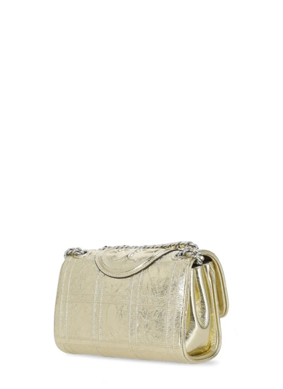 Shop Tory Burch Fleming Shoulder Bag In Gold