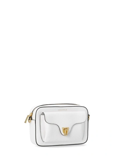 Shop Coccinelle Beat Soft Mini Shoulder Bag In White
